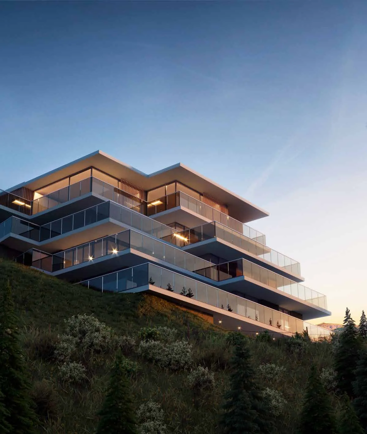 Elements Residences exterior at dusk on the Tschengla hillside